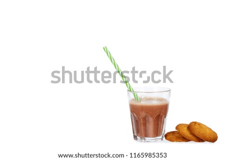 Glass of chocolate milk cocoa and straw with homemade cookies isolated on white background, copy space template.
