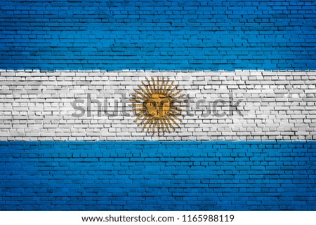 National flag of Argentina  on a brick background