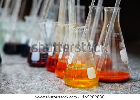 Colour and pigment solvent base test in textile laboratory                                Royalty-Free Stock Photo #1165989880