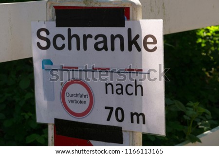 Attention barrier signs or traffic signs with German inscription - respect barrier passage forbidden-