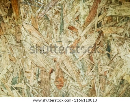 Background and texture of plywood's house wallpaper. Plywood is the remnants of the wood and are popular material for make furniture because it is cheap and a strange pattern.