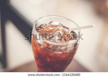 Iced coffee black (cold americano) in coffee shop  - Vintage effect style pictures