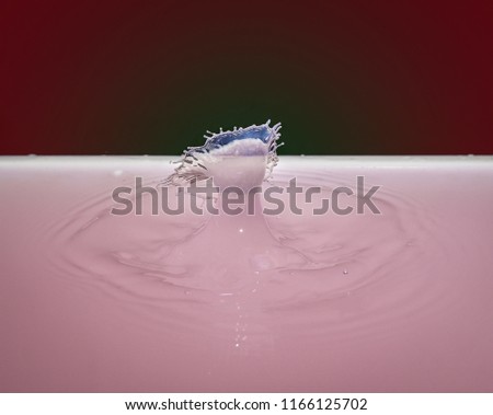 droplets collision and art Royalty-Free Stock Photo #1166125702