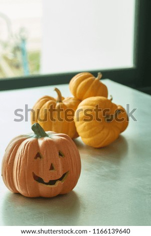 Jack O Lantern And Halloween Pumpkins On Table Back light Nature, copy space