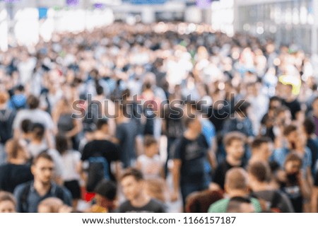 defocused people at a trade show