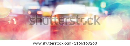 abstract traffic jam background on road / bokeh, view of transport, auto on the road in blurred background, cars, rear light, stop signal