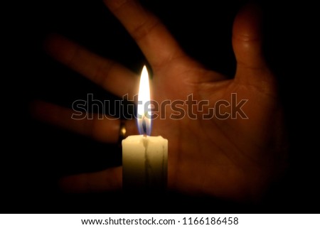 Candlelight at dark night