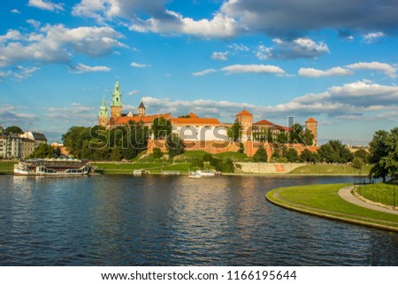 tourism and guide concept of medieval old castle in river waterfront old city district  