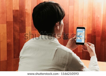 Men to operate the smart phone