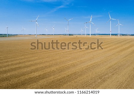 field with wind generators in Germany
