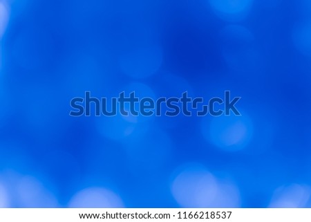 Blurred blue bokeh texture background