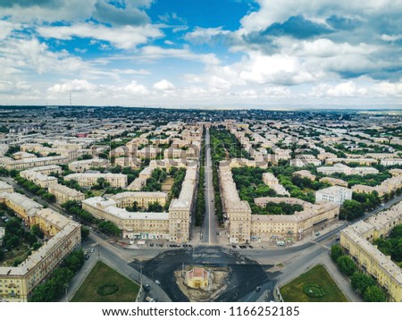 Aerial drone panoramic view of historical city center of Magnitogorsk, single style of buildings architectural ensembles of 50s with little gardens inside, Magnitogorsk, Russia