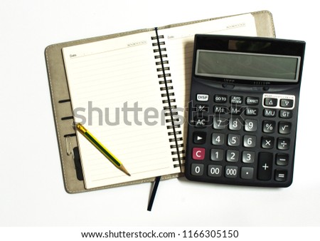 Calculator,pencil and note book on white background.