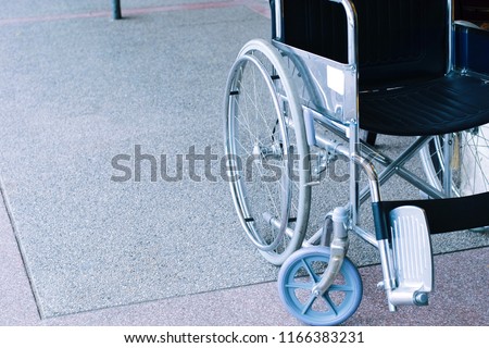 Empty wheelchair waiting for patient services at hospital.
