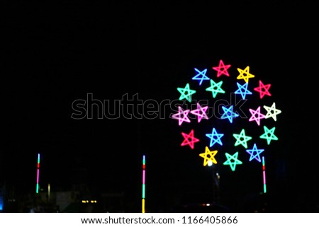scenery far away blurry vision lighting on star symbol from outdoor carnival at night so impressive signage pattern for awesome abstract background