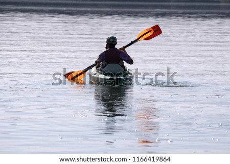 people enjoying kayaking on the river