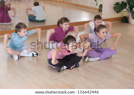 group of children engaged in physical training in the gym. Horizontal. Royalty-Free Stock Photo #116642446