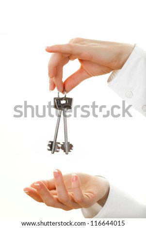 Female hand with house key