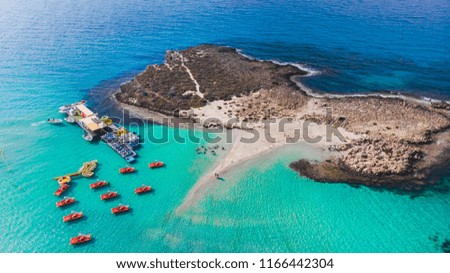 Nissi beach in Ayia Napa, clean aerial photo of famous tourist beach in Cyprus, the place is a known destination on island and is formed from a smaller island just near the main shore