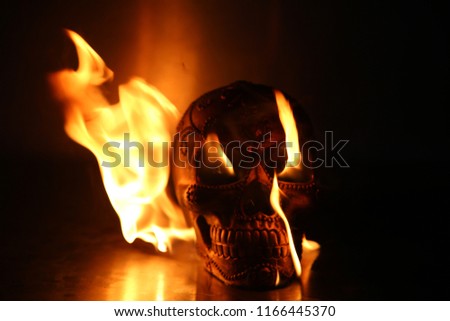Halloween. Human Skull on fire. 