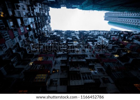a big asia city by night to the sunrise with all the lights on the streets and skyline