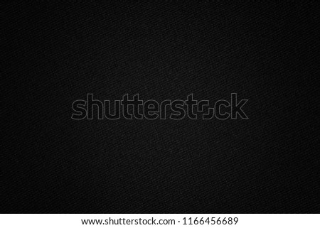 Black texture of synthetic fabric. Textile background.