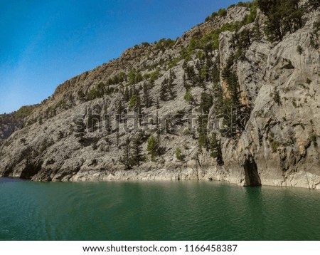 Turquoise lake and mountains. Turkish Green Canyon