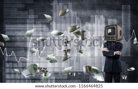 Businessman in suit with old TV instead of head keeping arms crossed while standing against flying euros and analytical charts drawn on wall on background. 3D rendering.