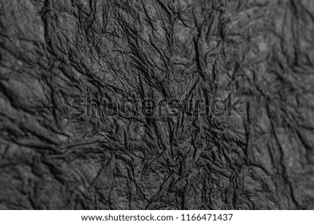 black crumpled paper texture background handmade