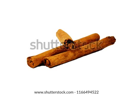 Tossed cinnamon sticks isolated on white background