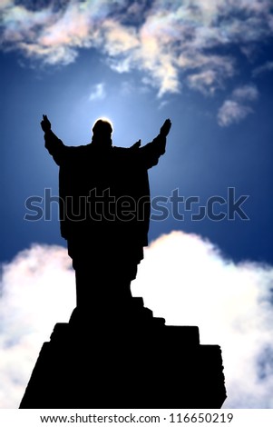 back light of statue of Jesus Christ giving the blessing