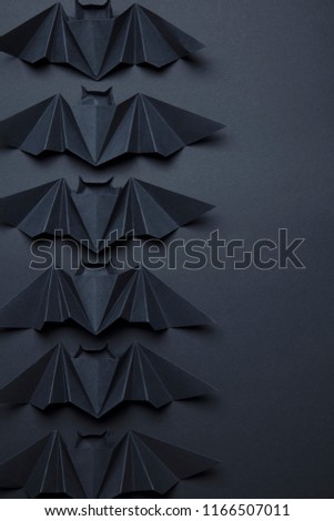 Halloween spooky dracula bats background made from origami