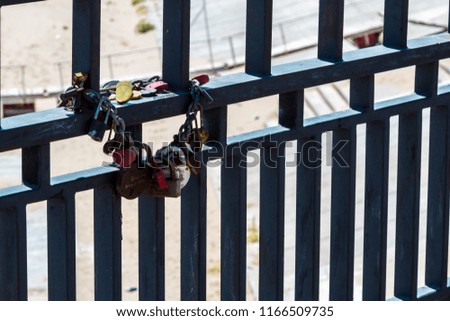 Metal locks on the fence