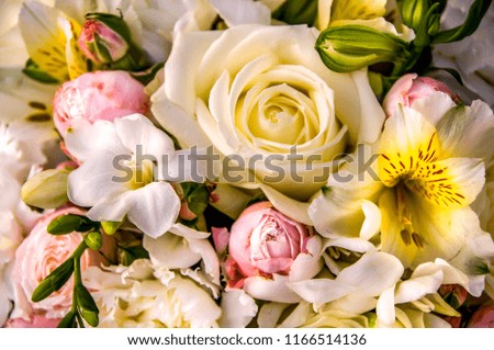 a bouquet of white, pink, yellow flowers bouquet