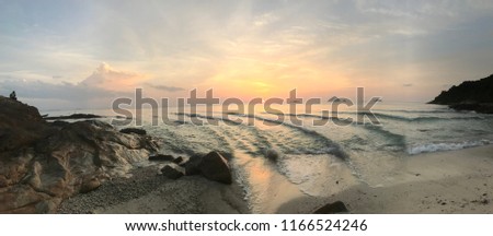 Panorama picture of beach at sunset