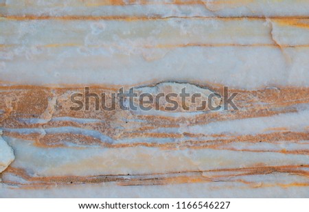 pattern of streaks of yellow natural marble stone,