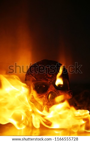 Halloween. Human Skull on fire. Fire and Flames of HELL Burn a Human Skull for all of eternity. Fire and Flame. Halloween Concepts and Images.