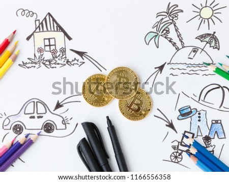 Coins of popular crypto currency bitcoin. Concept. Bitcoins can pay for the purchase of real estate, car, vacation and many other purchases.