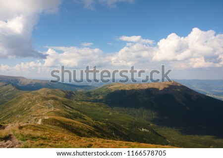 Cloudy sky landscape with mountains