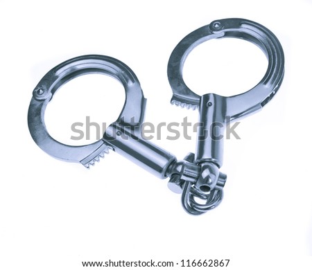 Metallic handcuffs isolated on a white background