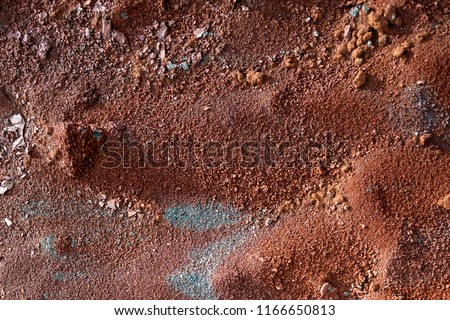 Red earth or soil background. Tropical laterite soil  background of red clay. Dry Orange surface, Picture of natural disaster. Drought land Caused by global warming and deforestation.