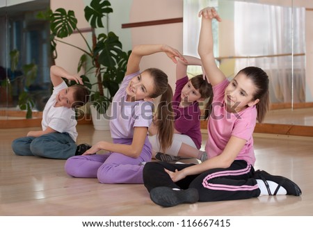 group of children engaged in physical training in the gym. Horizontal. Royalty-Free Stock Photo #116667415