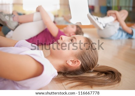 group of children engaged in physical training in the gym. Horizontal. Royalty-Free Stock Photo #116667778