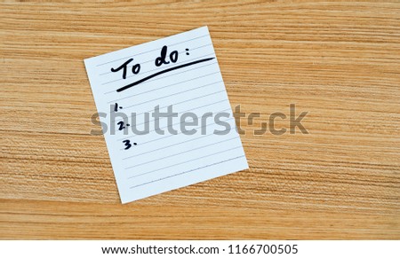 To do list written on paper.