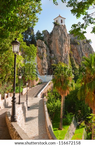 Bell tower, castle, Guadalest village, Alicante, Costa Blanca, Spain,  vertical Royalty-Free Stock Photo #116672158