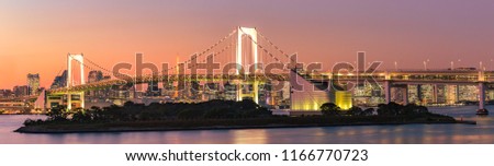 Panorama view of Tokyo Skyline at rainbow bridge Sunset twilight in Japan 
