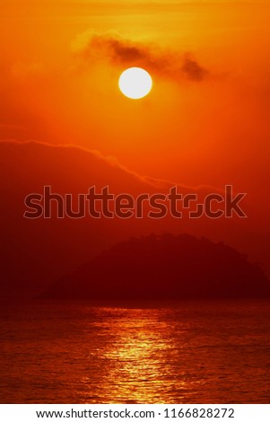 Stunning sunrise over the Atlantic ocean view from Copacabana beach, Rio de Janeiro of Brazil