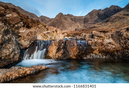 Located in Glen Brittle on the Isle of Skye lies the Fairy Pools a popular tourist attraction with the Cuillin Ridge in the background