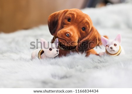 toy dog with puppies for cars