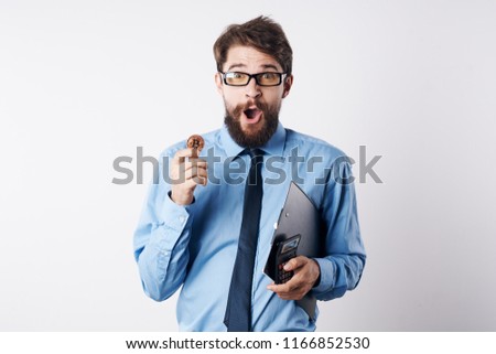 surprised chef wearing glasses and coin in hand                               